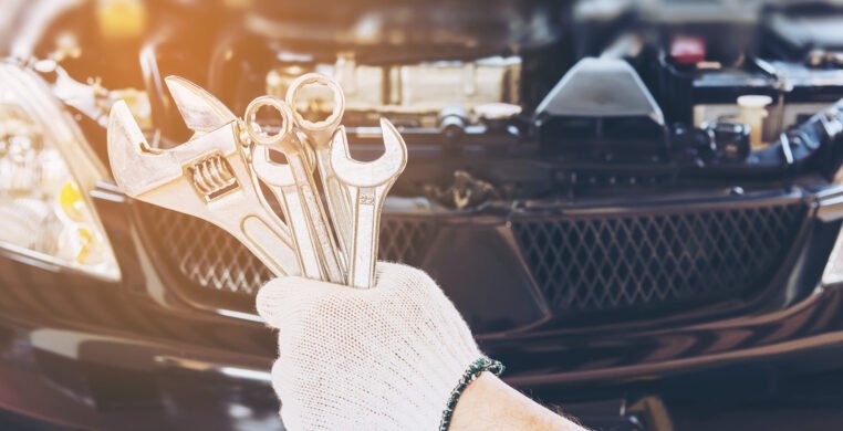 Mechanic man repairing car